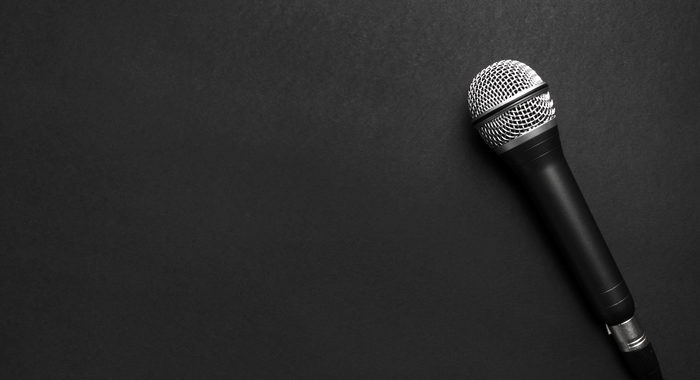 Black silver microphone black background